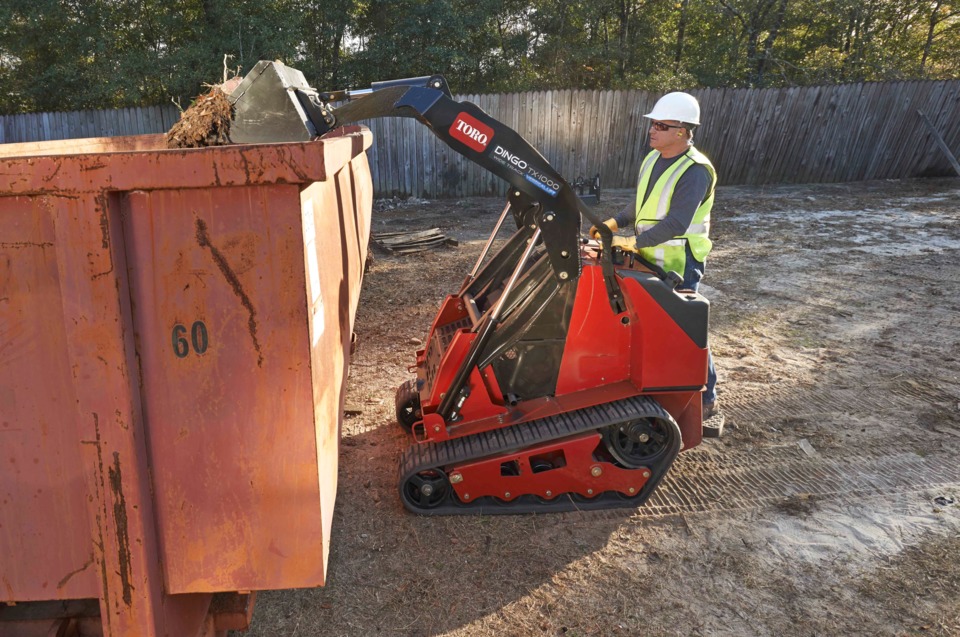 Toro Dingo TX1000 Dumping Trash
