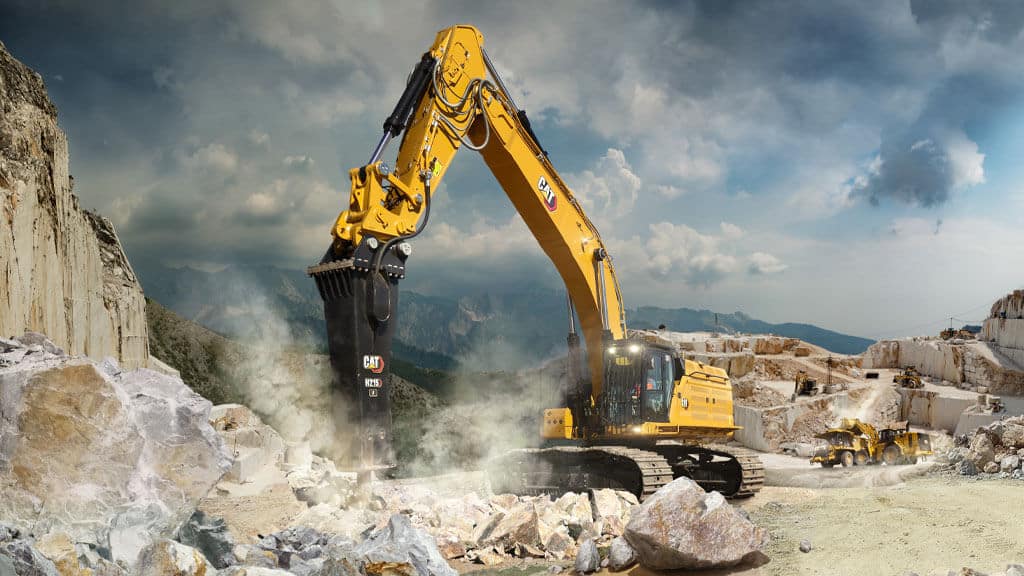 Cat Performance Hydraulic Hammer Working in a Quarry